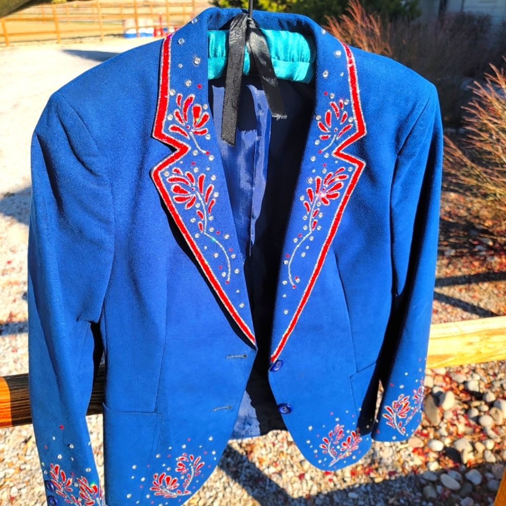 Blue with red and white crystal suede jacket. Great for Rodeo Court.